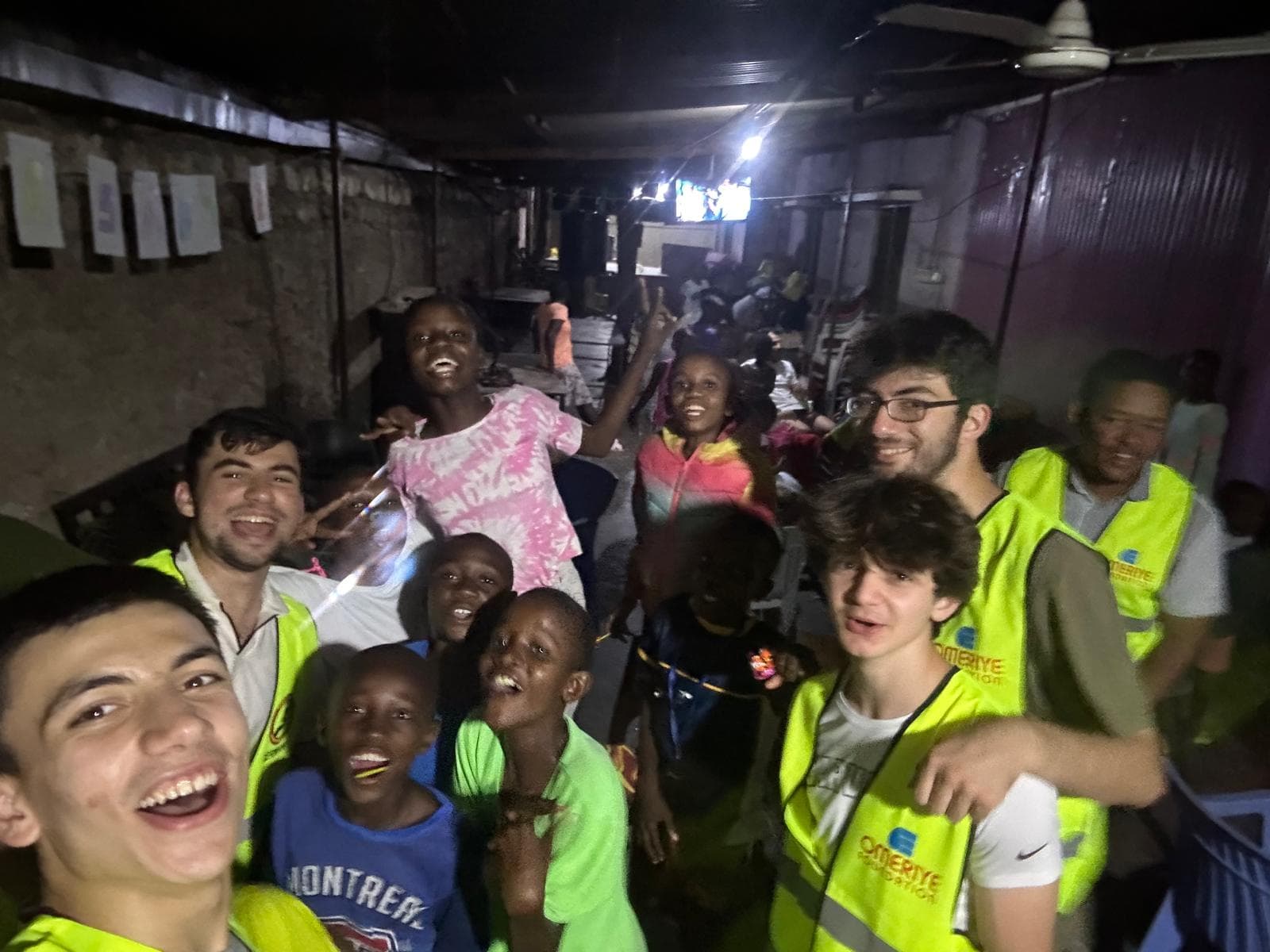 Volunteers joining hands together