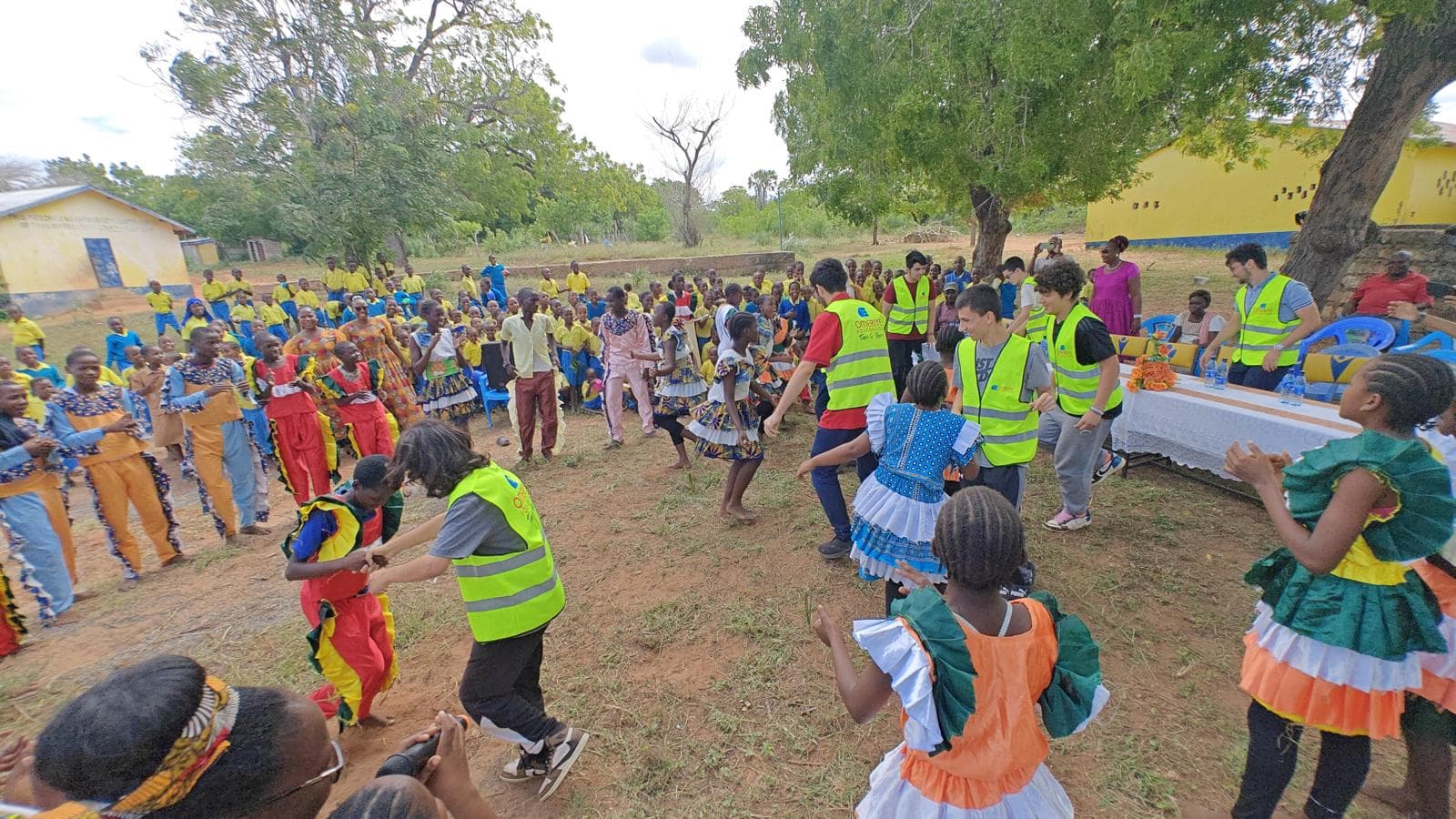 Volunteers joining hands together